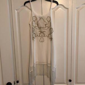 White dress with gold bead detail